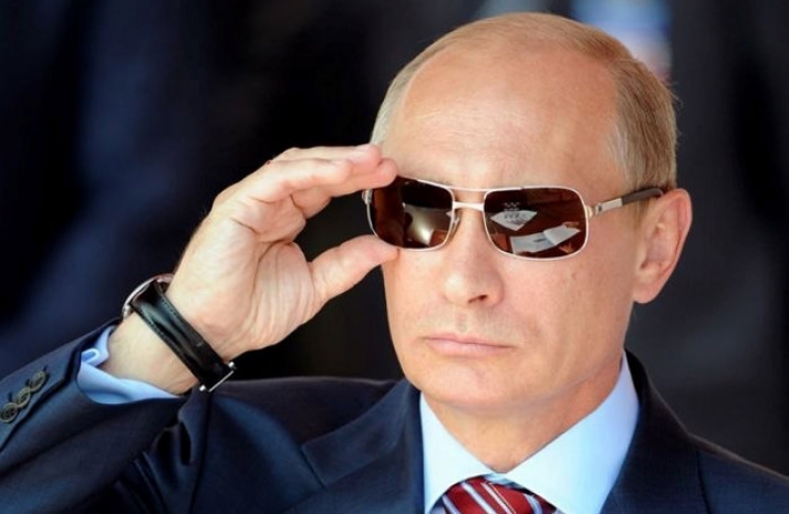 Путин настаивает на полном прекращении огня на Украине