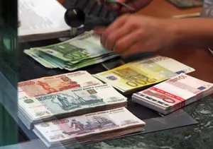 Тенге немного обесценился