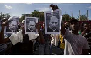 Гаитянские демонстранты попросили помощи у Путина