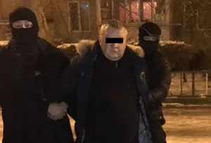 В Алматы за взятку задержаны подполковник и капитан полиции