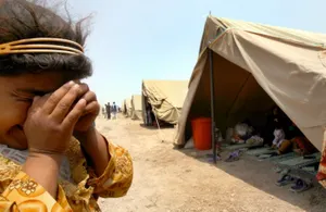 Переодетый в женщину смертник убил 14 человек в иракском лагере беженцев