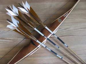 Лучники тренируются в недостроенной столовой мечети в Костанае