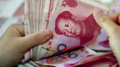 Российский бизнес готовится заменить доллары юанями