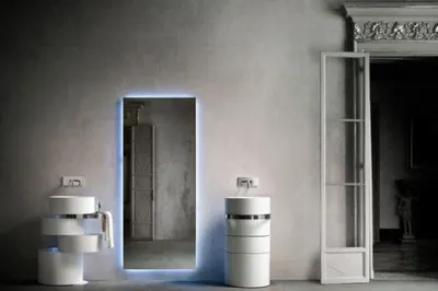 Необычная цилиндрическая раковина с вращающимися ящиками