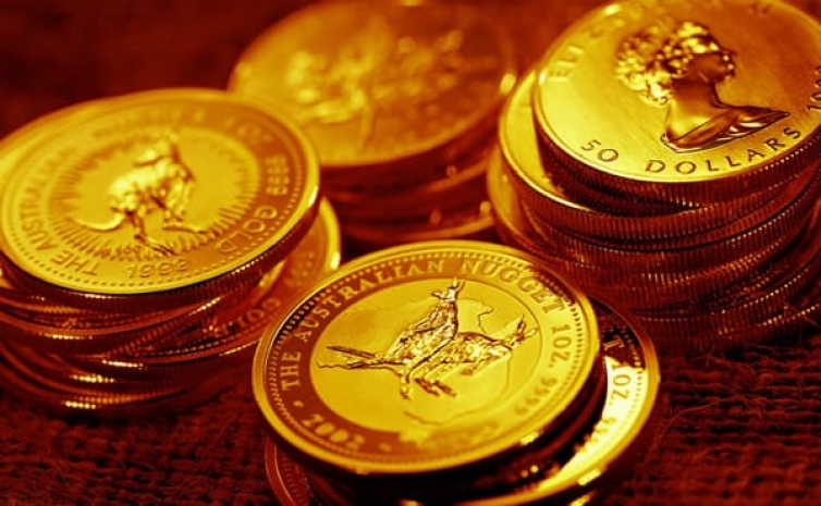 Инвесторы по всему миру скупают золотые монеты
