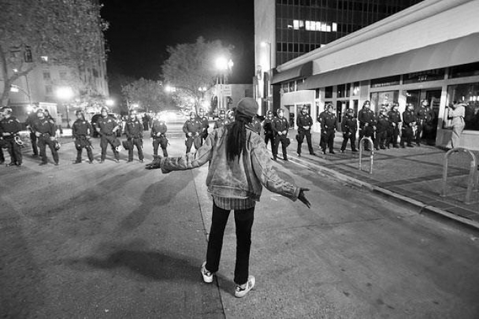 Застреливший подростка в Фергюсоне полицейский уйдет в отставку