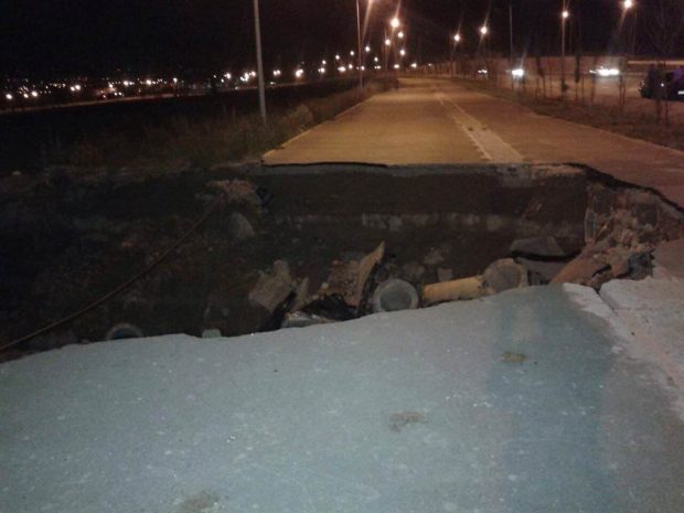 В Алматы после дождей провалился асфальт