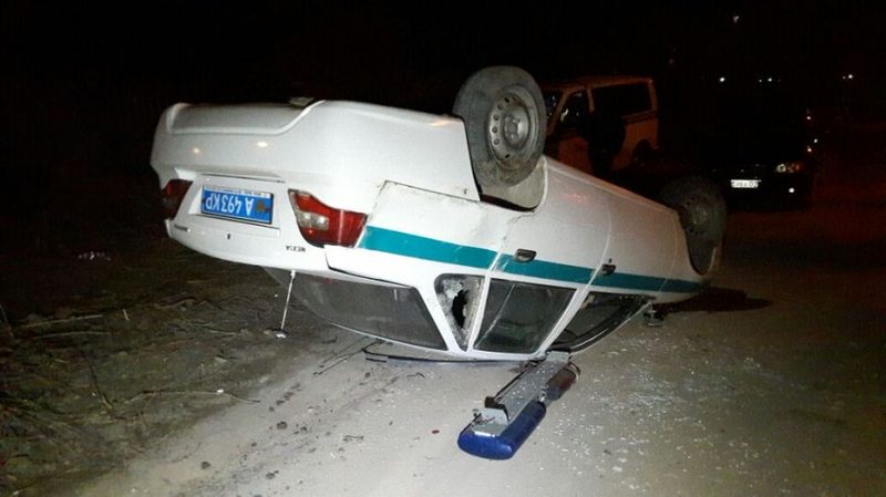 Полицейская машина перевернулась в ДТП в Алматы. ФОТО